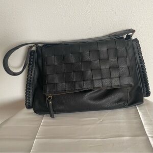 Time and Tru women’s woven black purse. 21” shoulder strap. Hidden pouch in flap
